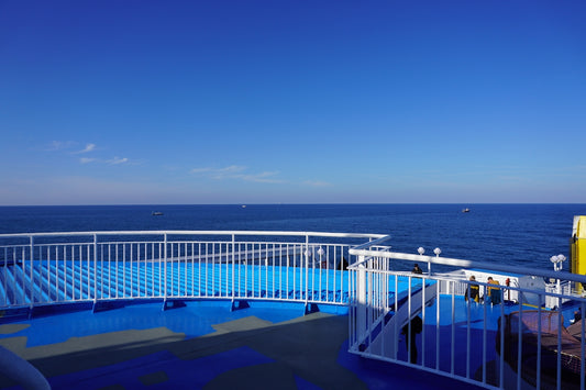 A view of the ocean from the deck of a cruise ship