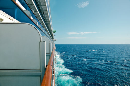 A view of the back of a boat on the water