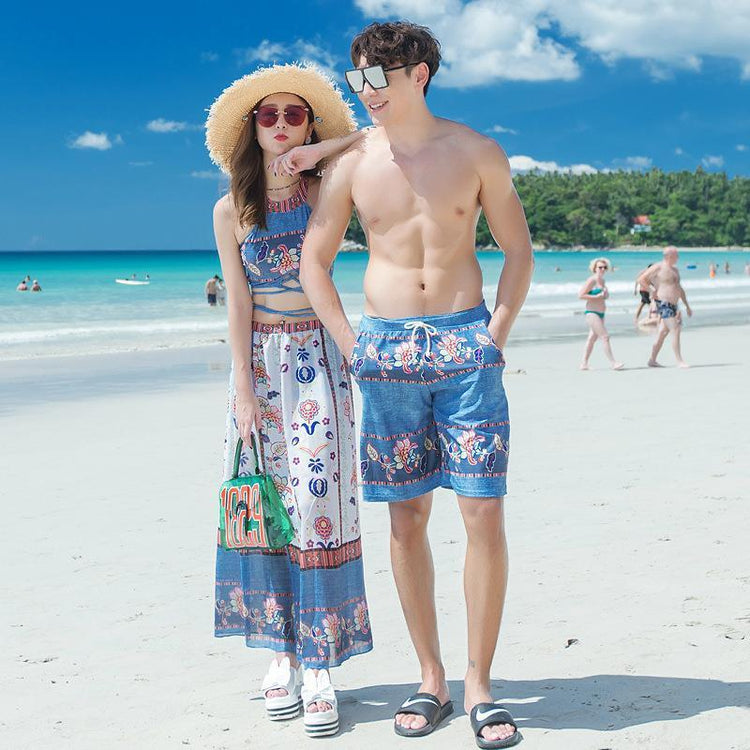 Teen boy and girl in stylish swimwear walking on the beach, vacation-ready fashion for teens.