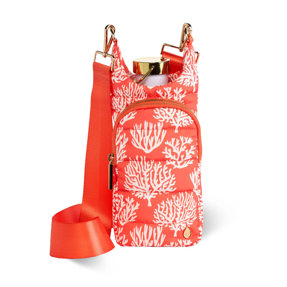 Wanderfull® HydroBag® crossbody in coral print with matching insulated pouch—vacation-ready travel bag.