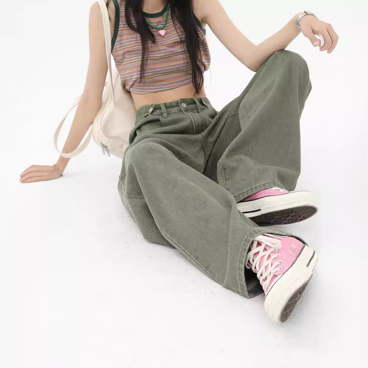 Teen girl wearing wide-leg olive pants with pink sneakers – teen bottoms for cruise fashion, school, and vacation wear.