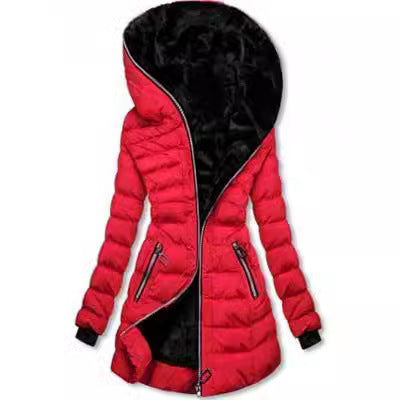 Red women’s zip-up coat with black fur-lined hood – women’s outerwear for cruise fashion and vacation wear.