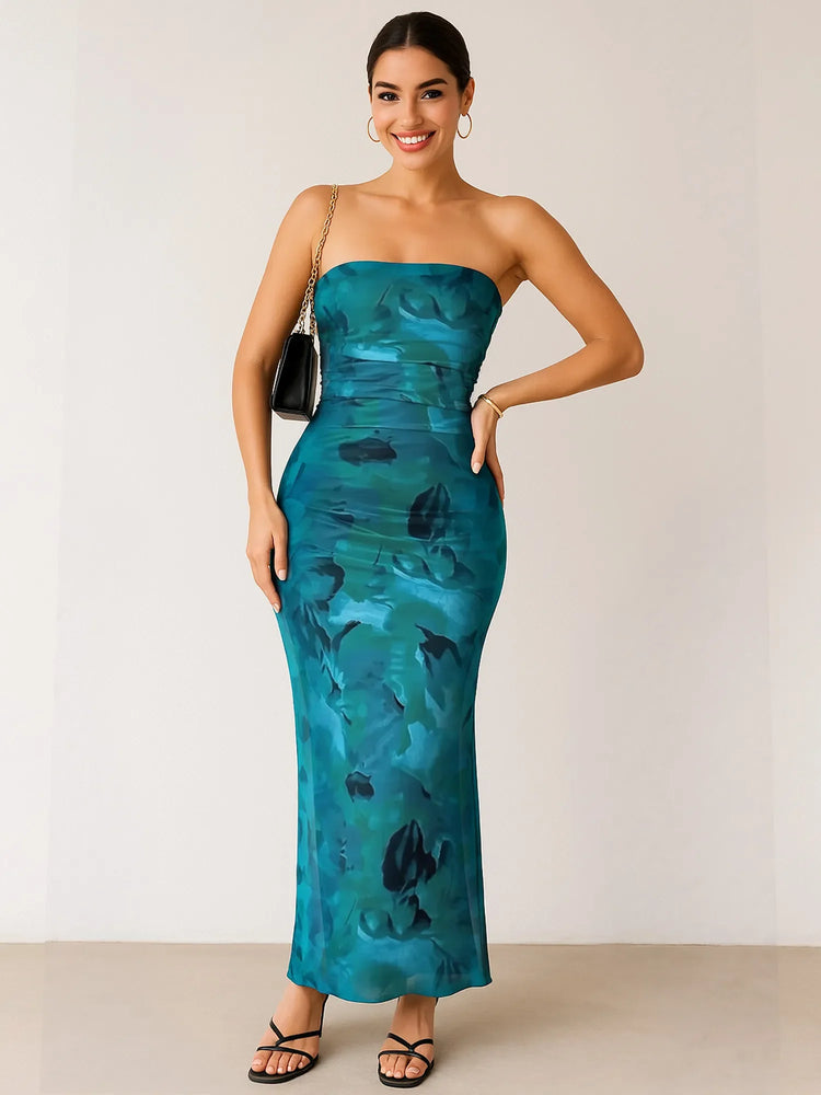 Teen girl in a strapless teal evening dress—stylish cruise-ready formal wear.