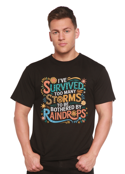 Man wearing a black t-shirt with colorful text design on a white background