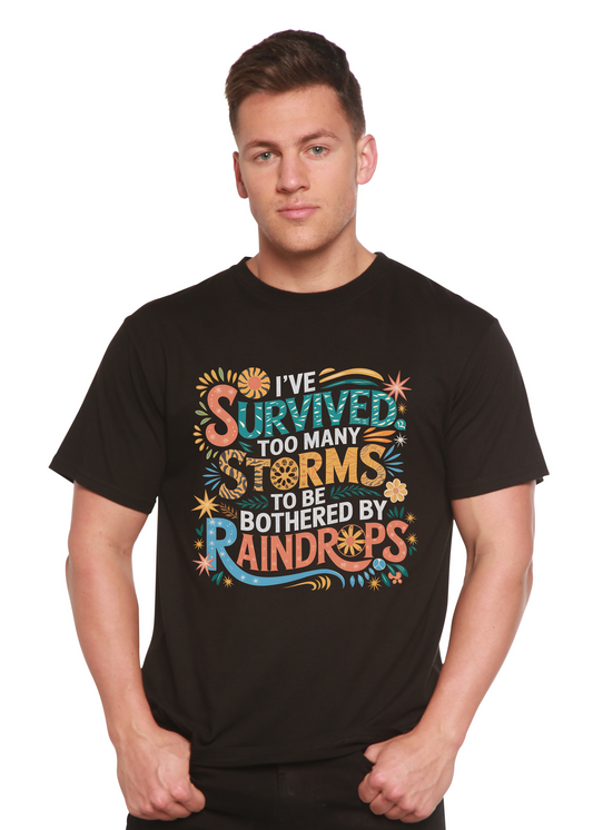 Man wearing a black t-shirt with colorful text design on a white background