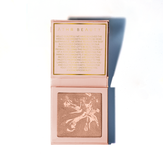 Makeup product with 'Alessi Beauty' branding on a white background