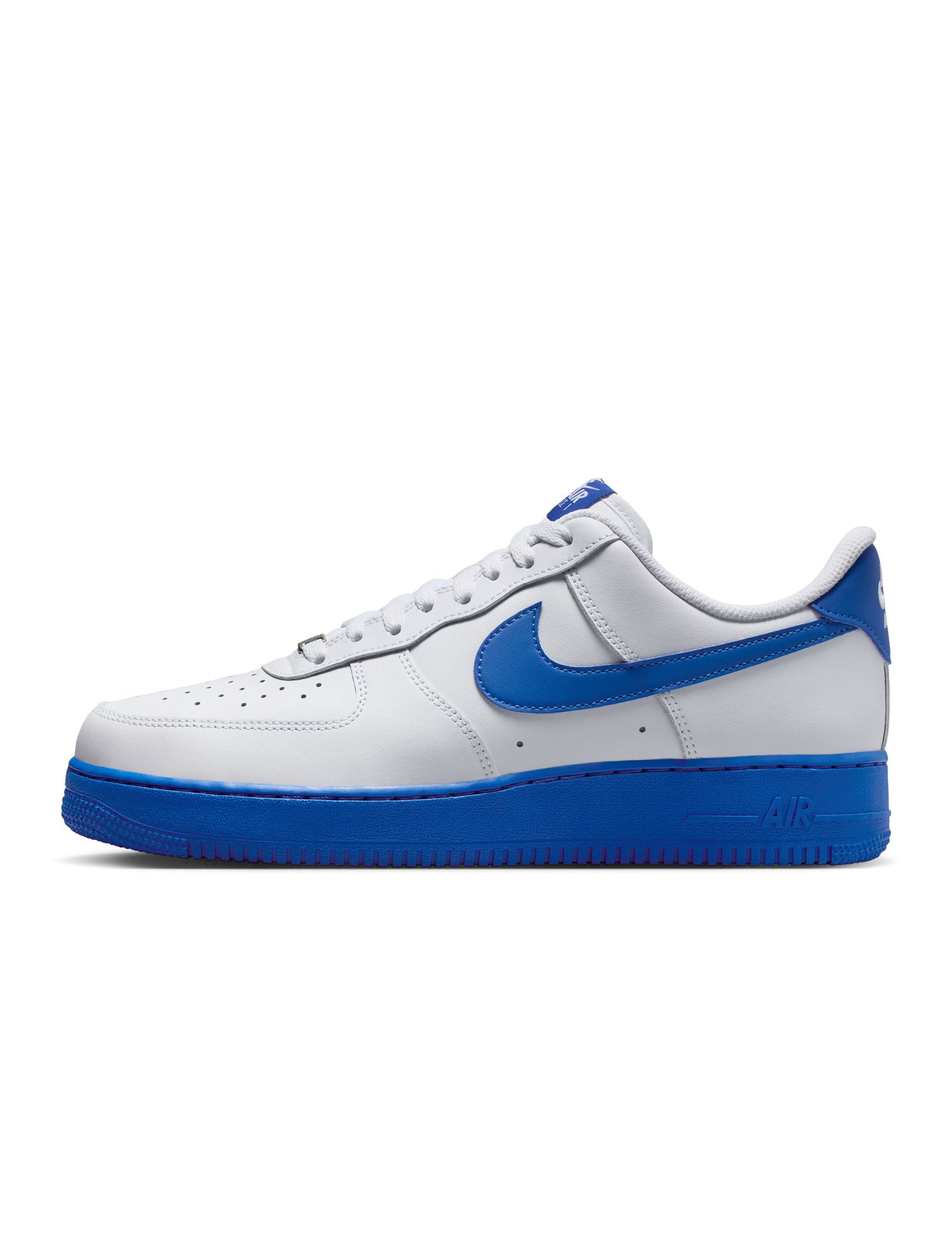 White sneaker with blue swoosh logo and sole on a white background