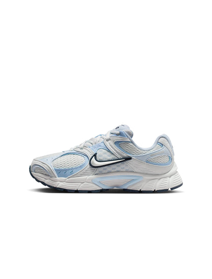 White and blue running shoe with Nike logo on a white background