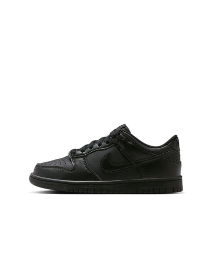 Brown sneaker with black sole on a white background