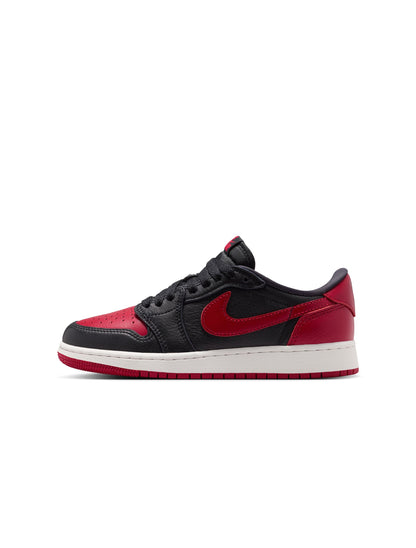 Black and red sneaker with a white sole on a white background