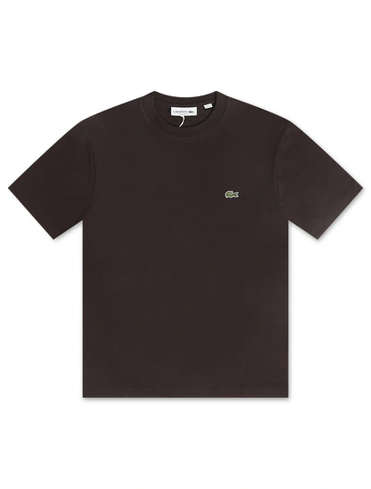 Black t-shirt with a brand logo on a white background