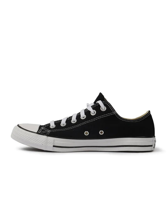 Black sneaker with a white Nike logo on a white background