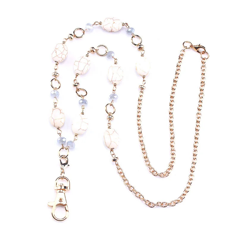 metal beaded ID lanyard on white background.