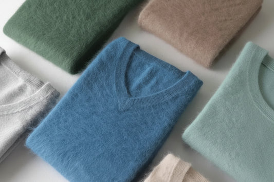 Folded sweaters in various colors on a light background with 'LHZSYY' branding.