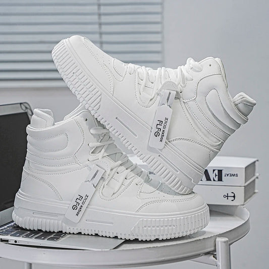White sneakers with visible brand tags on a gray surface