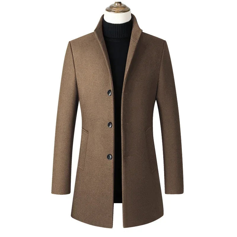 Brown coat on a mannequin with 'JAMES WANGKING' logo in the corner.