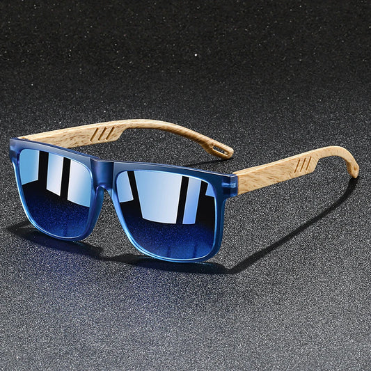 Sunglasses with blue lenses and wooden frames on a dark textured background