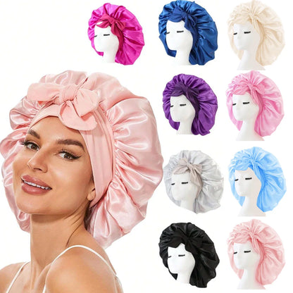 Woman wearing a pink satin bonnet with various other satin bonnets displayed on mannequins in the background.