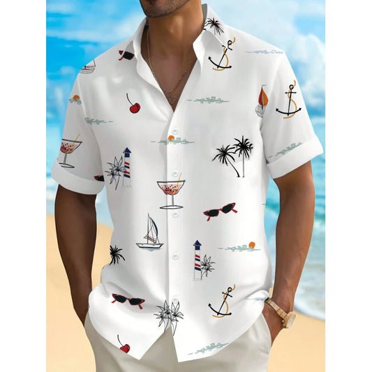 White shirt with beach-themed patterns worn by a person on a beach background