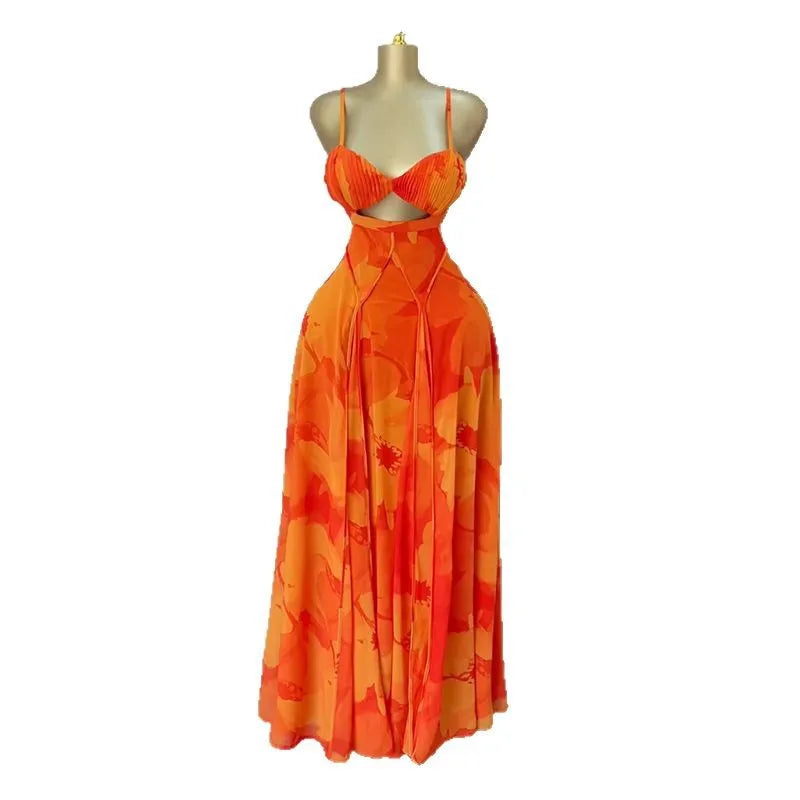 Orange floral dress on a mannequin against a white background