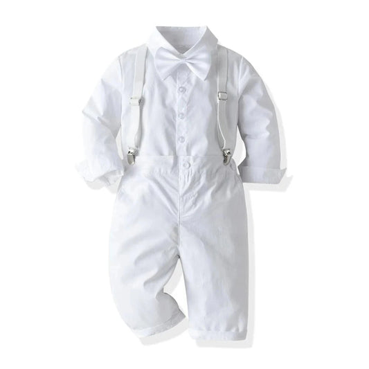 White baby romper with suspenders on a white background