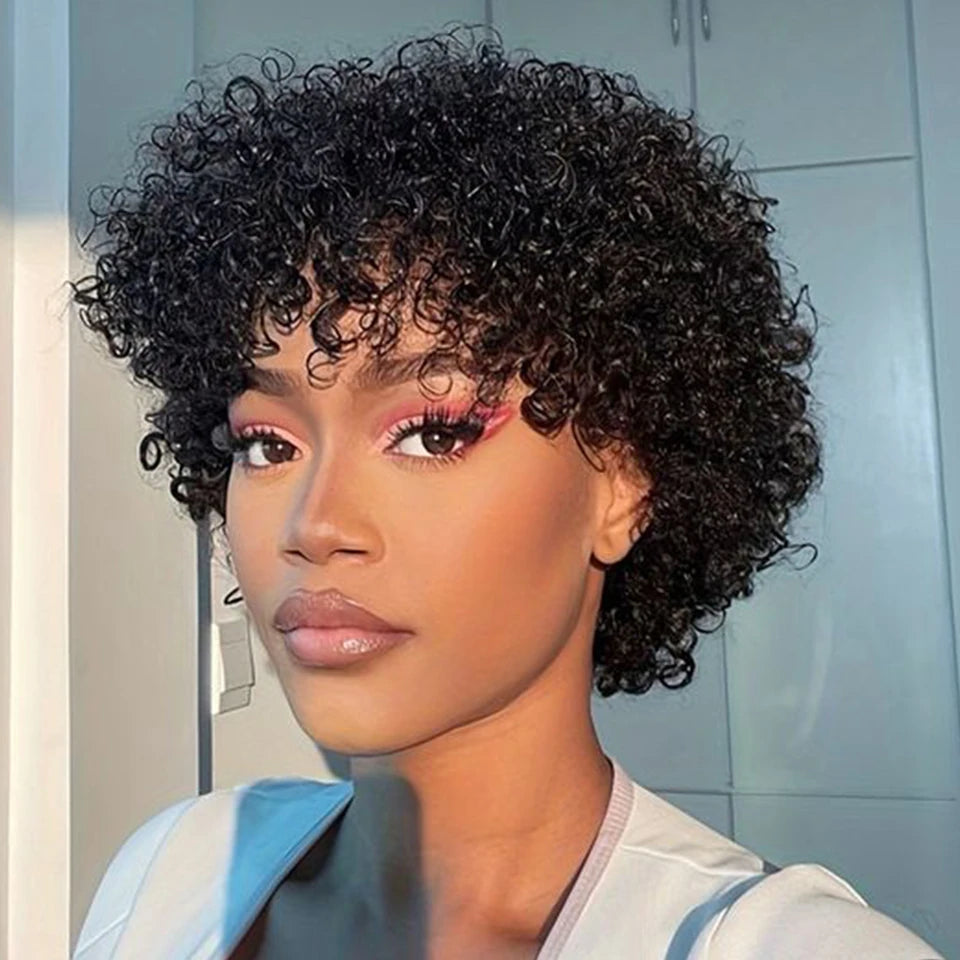 Woman with short, curly black hair in a bathroom setting