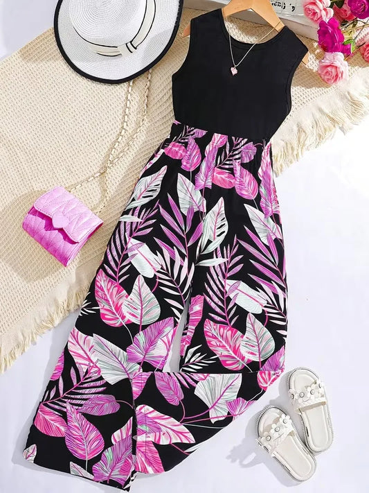 Black dress with pink leaf pattern on a white background