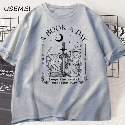 Unisex Graphic Cotton Tee – “A Book a Day” Fantasy Reader Shirt - The Dock Drop