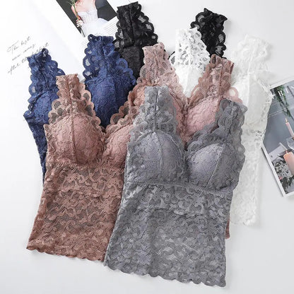 Set of lace bras in various colors on a white background