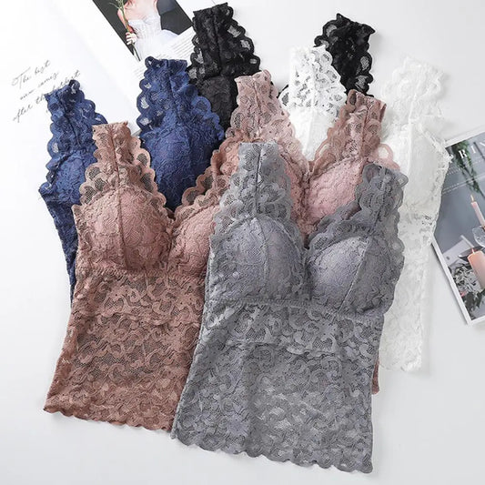 Set of lace bras in various colors on a white background