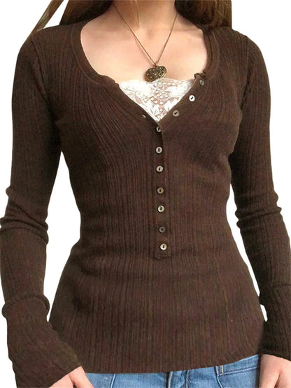 Brown ribbed sweater with lace trim worn by a person on a white background