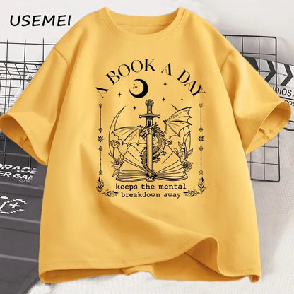 Unisex Graphic Cotton Tee – “A Book a Day” Fantasy Reader Shirt - The Dock Drop