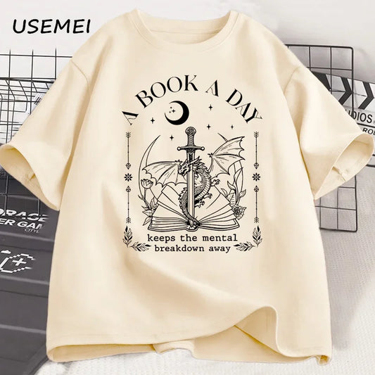 Unisex Graphic Cotton Tee – “A Book a Day” Fantasy Reader Shirt - The Dock Drop