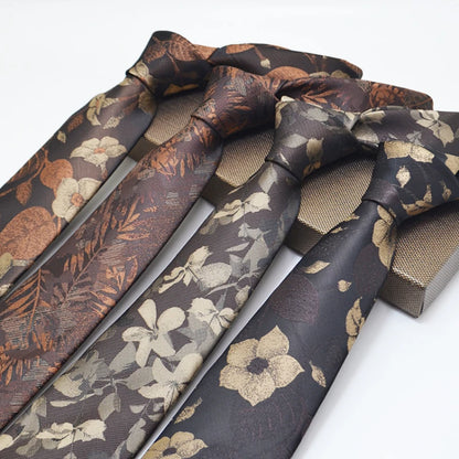 Set of floral-patterned ties on a white background