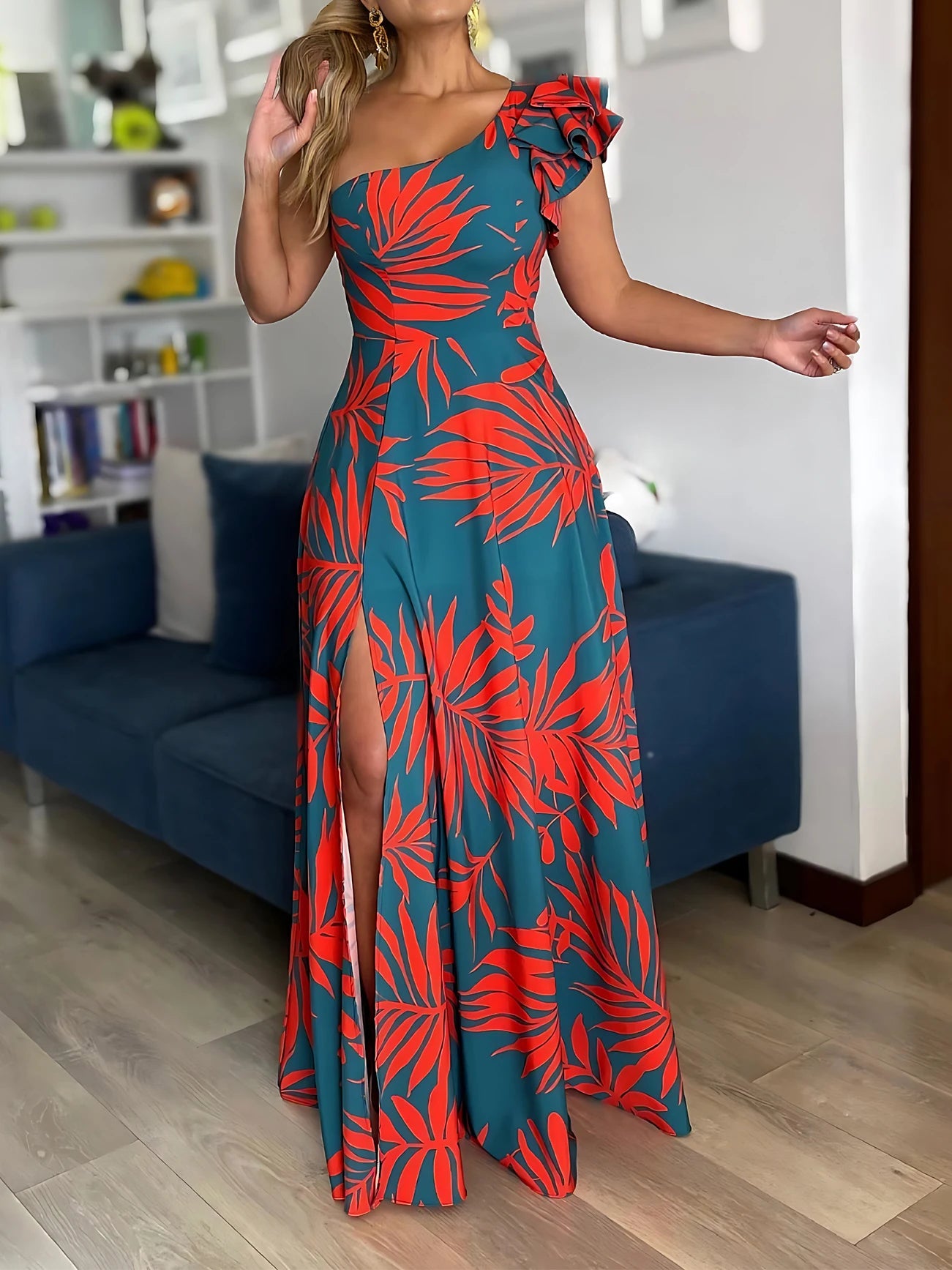 Woman wearing a blue and red floral dress in a living room setting
