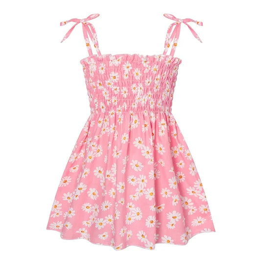 Pink floral dress with thin straps on a white background