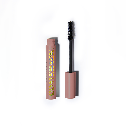 Mascara with brush on a white background