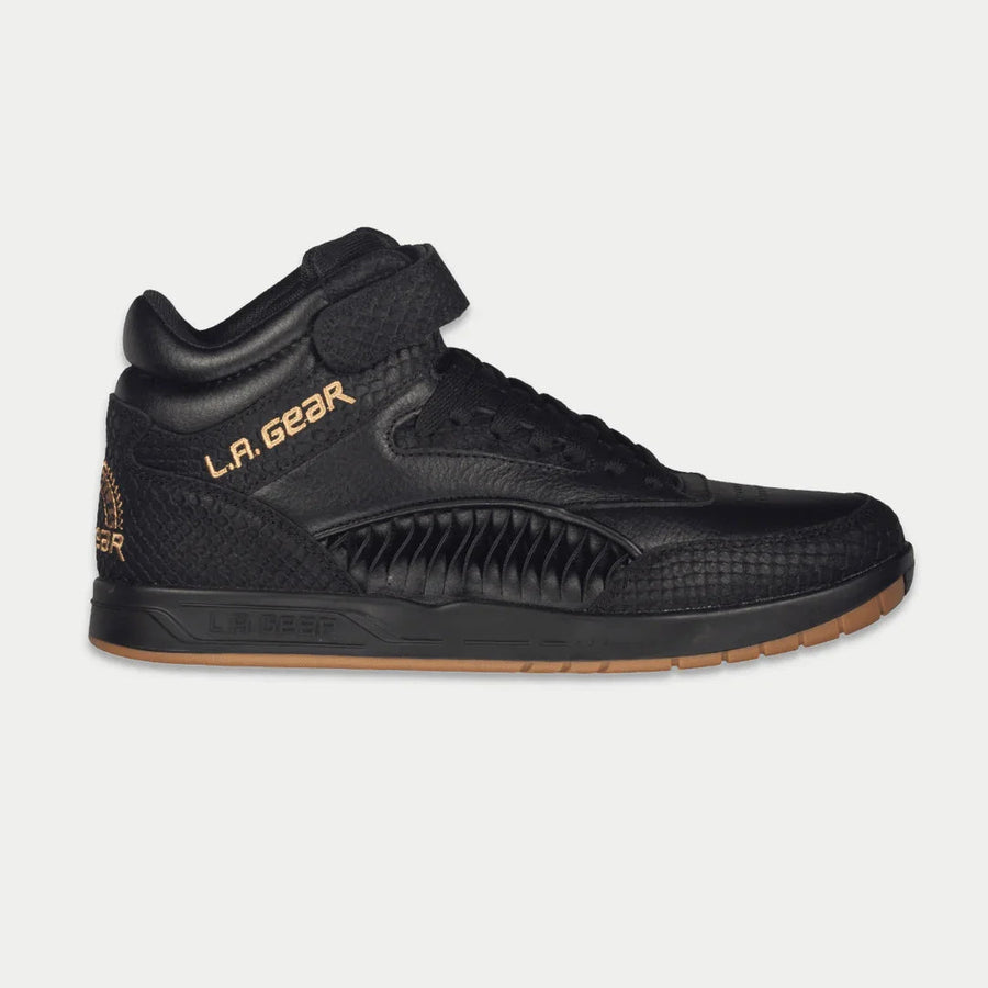 Black high-top sneaker with 'L.A. Gear' branding on a light gray background
