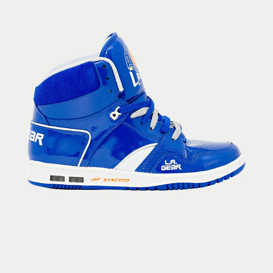 Blue high-top sneaker with white accents on a light gray background
