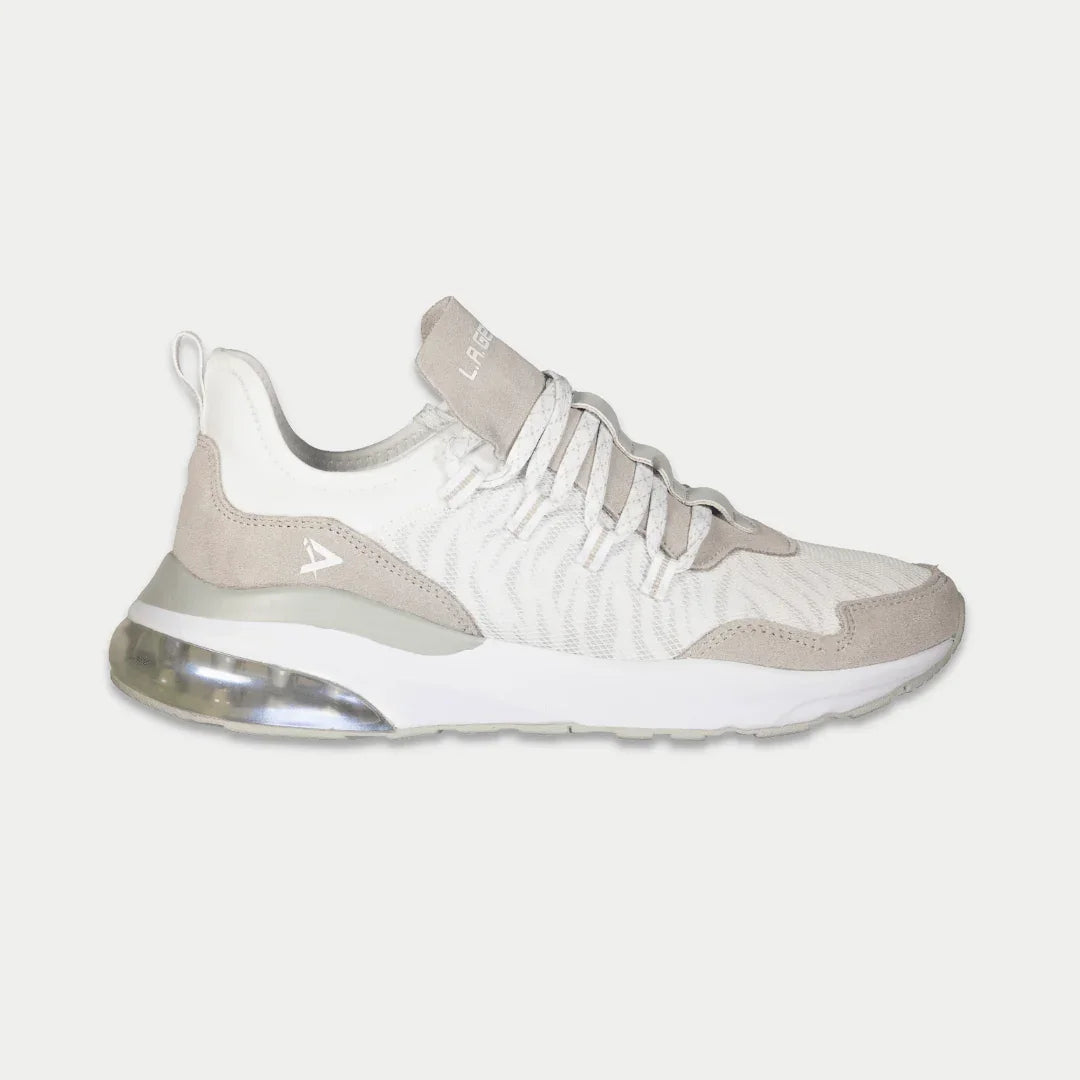 Beige and white sneaker on a light gray background