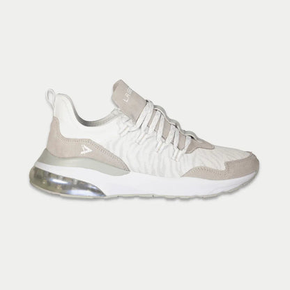 Beige and white sneaker on a light gray background
