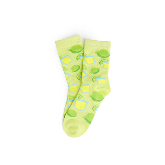 Pair of green socks with leaf pattern on a white background